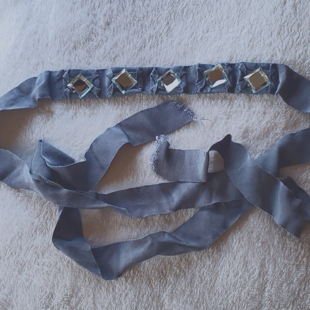 J Crew grey ribbon belt with mirrored decoration.